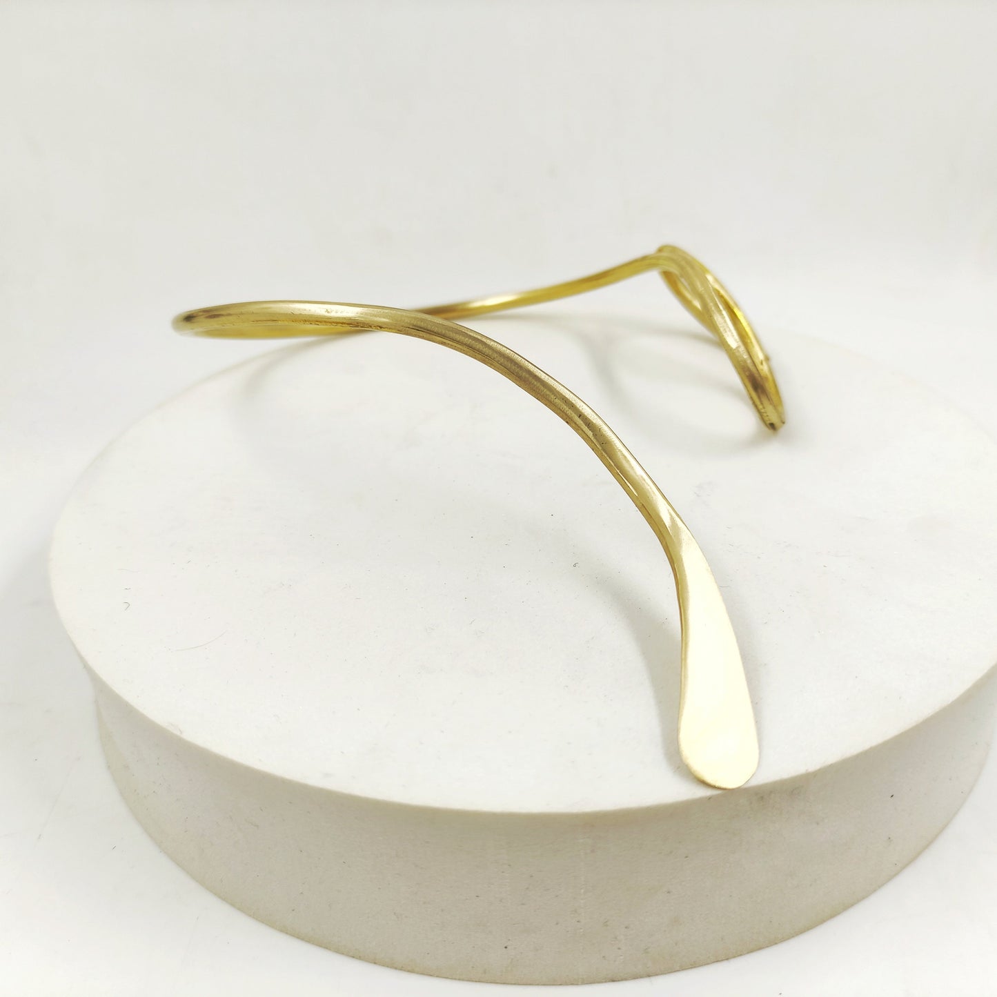 Hammered brass snake necklace