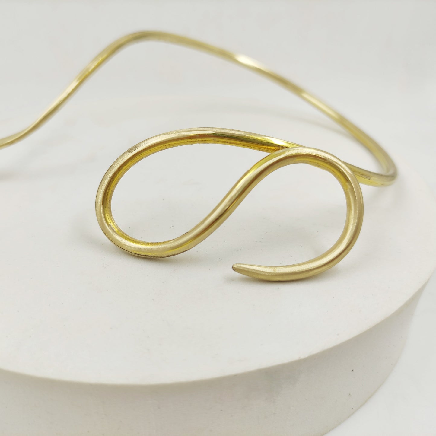 Hammered brass snake necklace