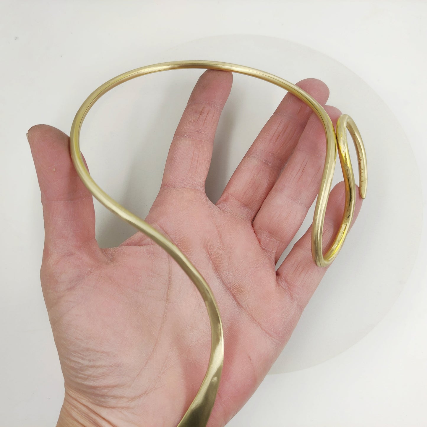 Hammered brass snake necklace