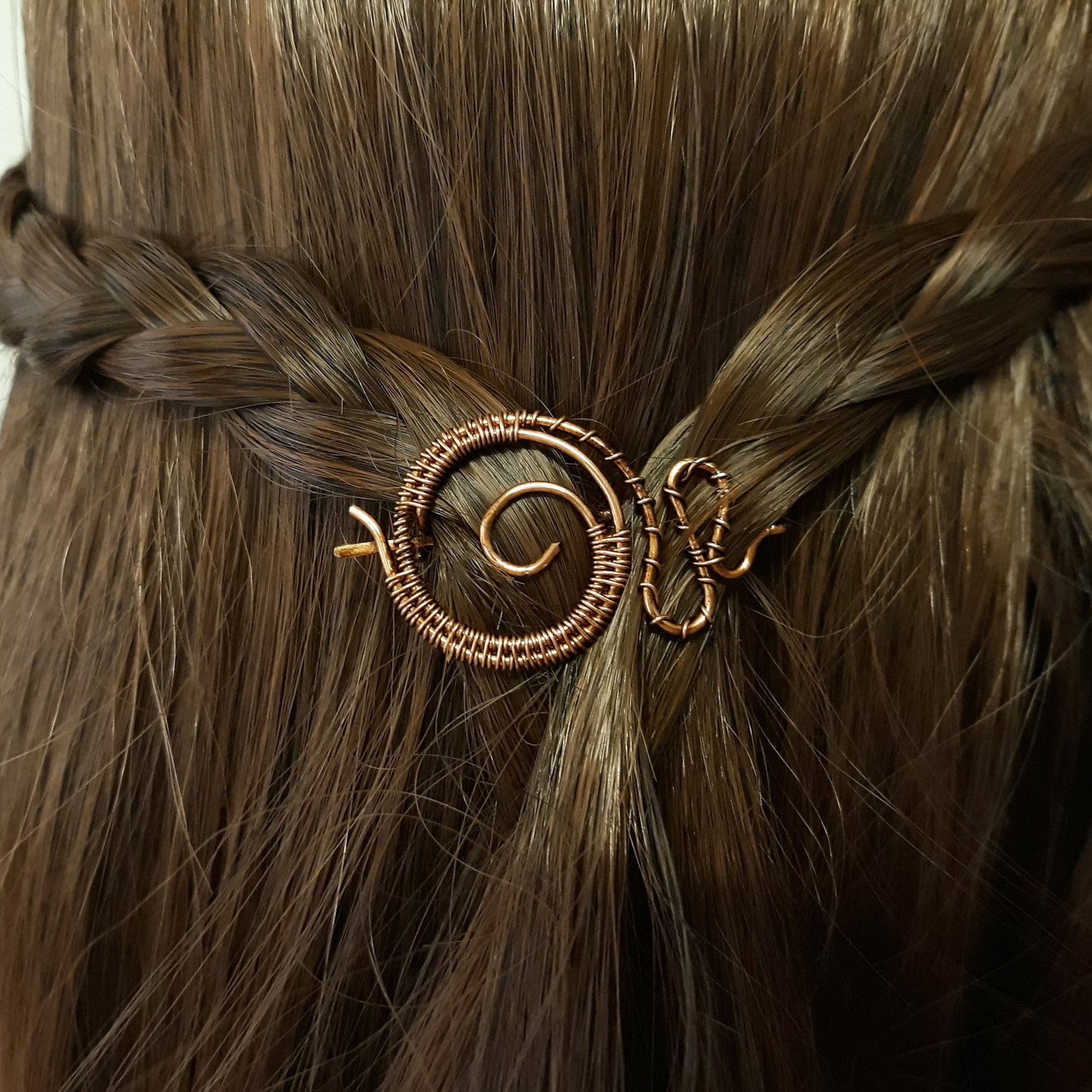 Kleine spiralförmige Haarspange aus Kupfer